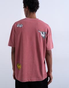 Model wearing Mason Newman x Topman oversized fit t-shirt with placement embroidery in washed pink