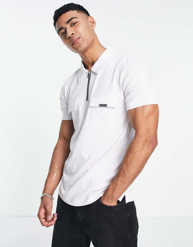 Mauvais double cargo pocket zipped polo in white