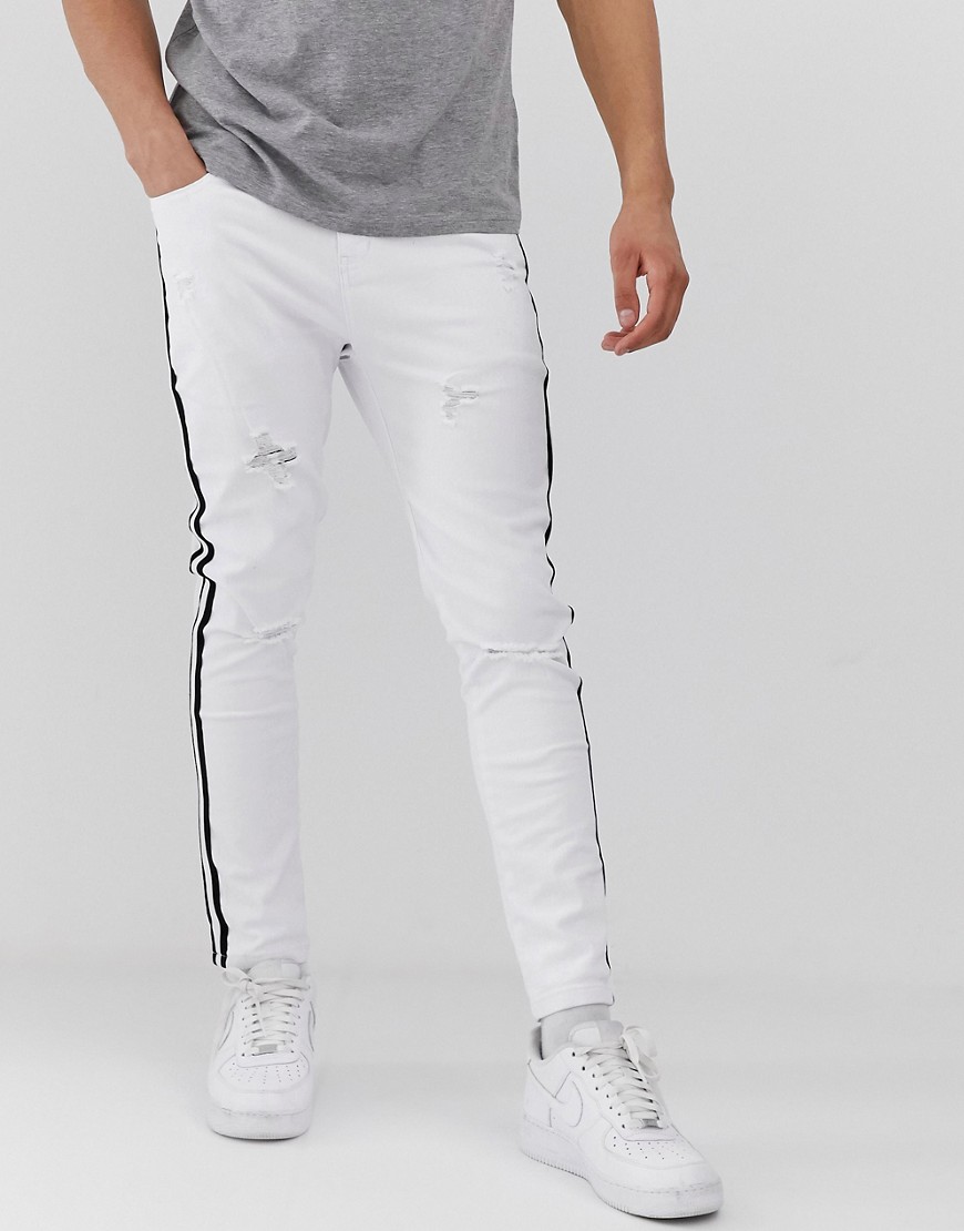 Mauvais muscle jeans with distressing and side stripe-White