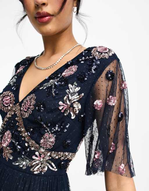 Vestito da cocktail in tulle azzurro di Maya Plus, €128, Asos