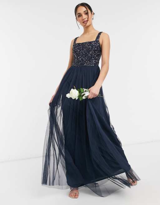 Maya - Lange mouwloze bruidsmeisjesjurk met vierkante hals, tule rok en bovenlaag met lovertjes met kleurschakering in marineblauw
