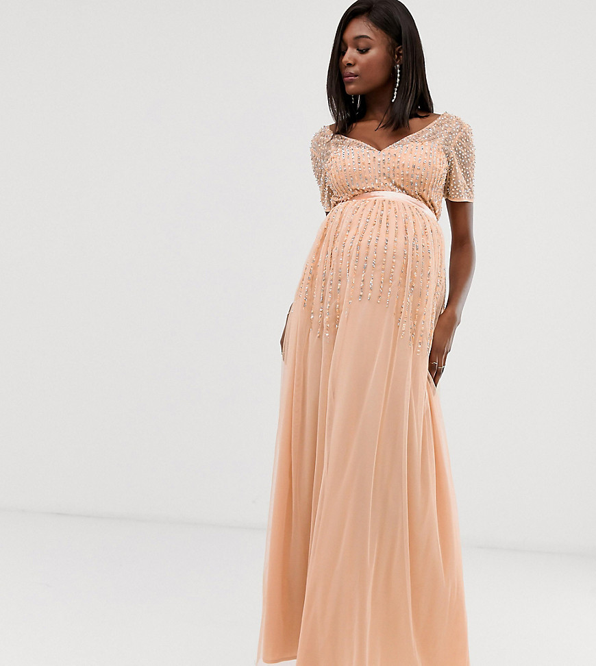 Maya Maternity - Geplooide lange jurk van mesh met lovertjes in zachte perzikkleur-Roze
