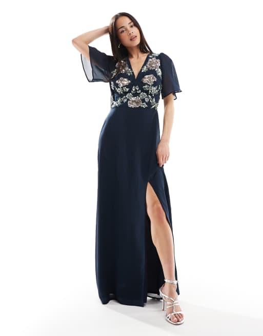 Maya - Maxi-jurk met korte ballonmouwen en bloemversiering in marineblauw, 2 van 4