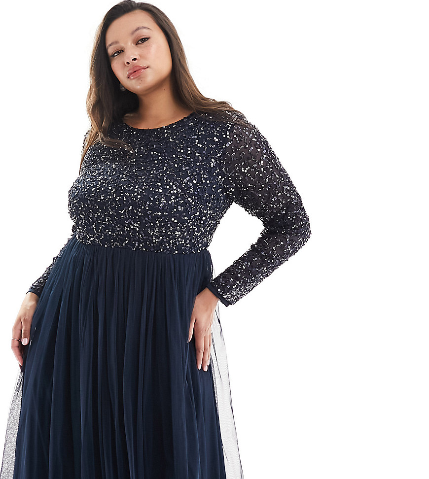 Plus-size dress by Maya Plus Takes you from the ceremony to the dancefloor High neck Sequin-embellished top Long sleeves Pleated skirt Zip back with hook-and-eye closure Regular fit True to size