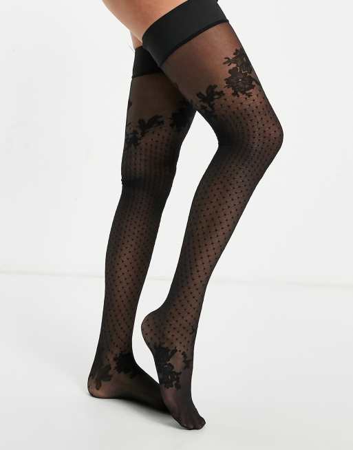 Medias negras con estampado de flores y ligas de velour Raine de Hunkemöller