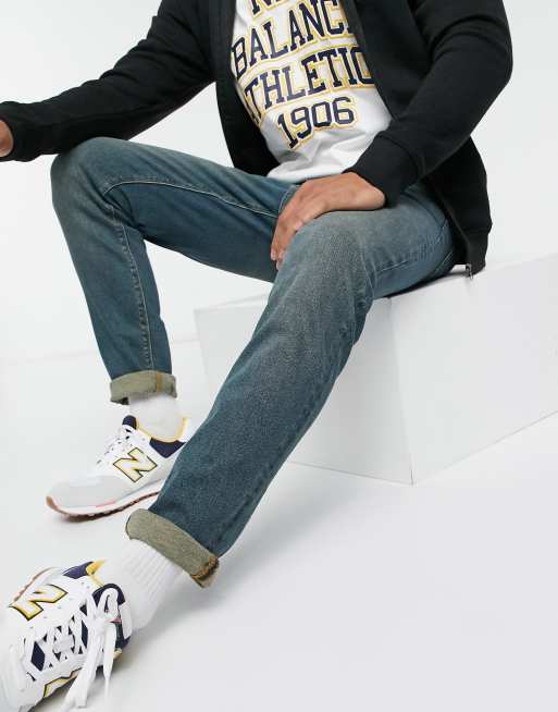 Medium forvaskede blå skinny jeans i vintagestil fra ASOS DESIGN