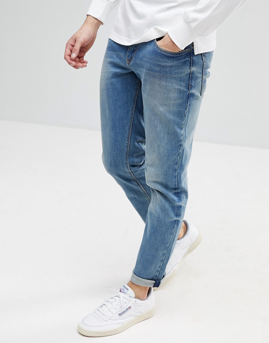 Medium forvaskede slim-fit jeans fra ASOS DESIGN-Blå