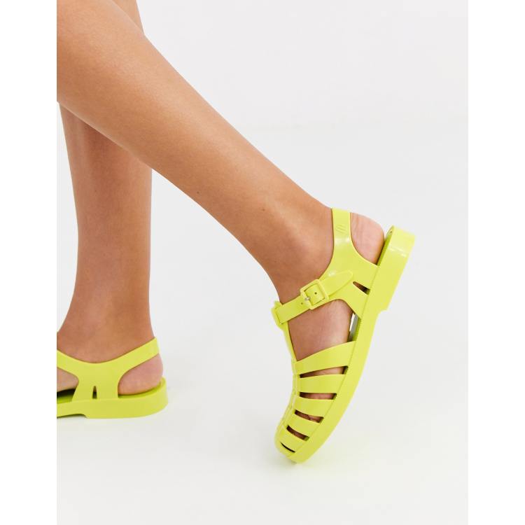 Melissa neon flat jelly shoes in green ASOS