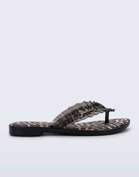 Melissa x GANNI slim flip flops in black - view 1