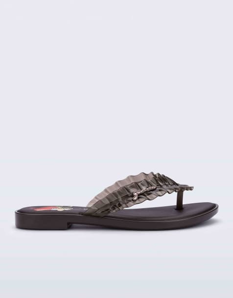 Melissa x GANNI slim flip flops in brown - view 1