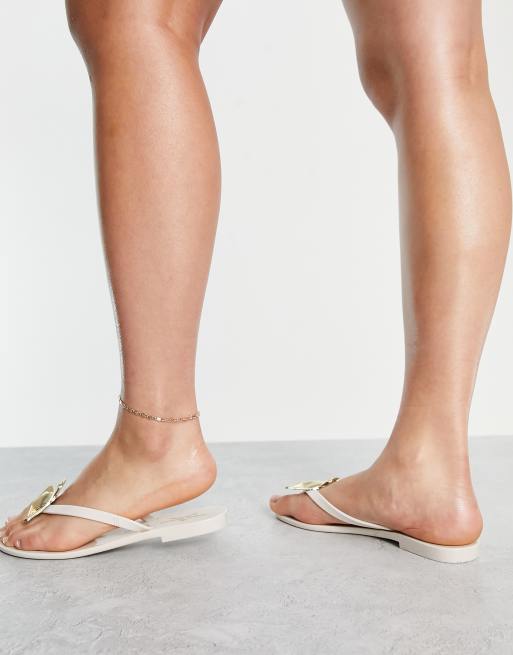 Ivory best sale flip flops