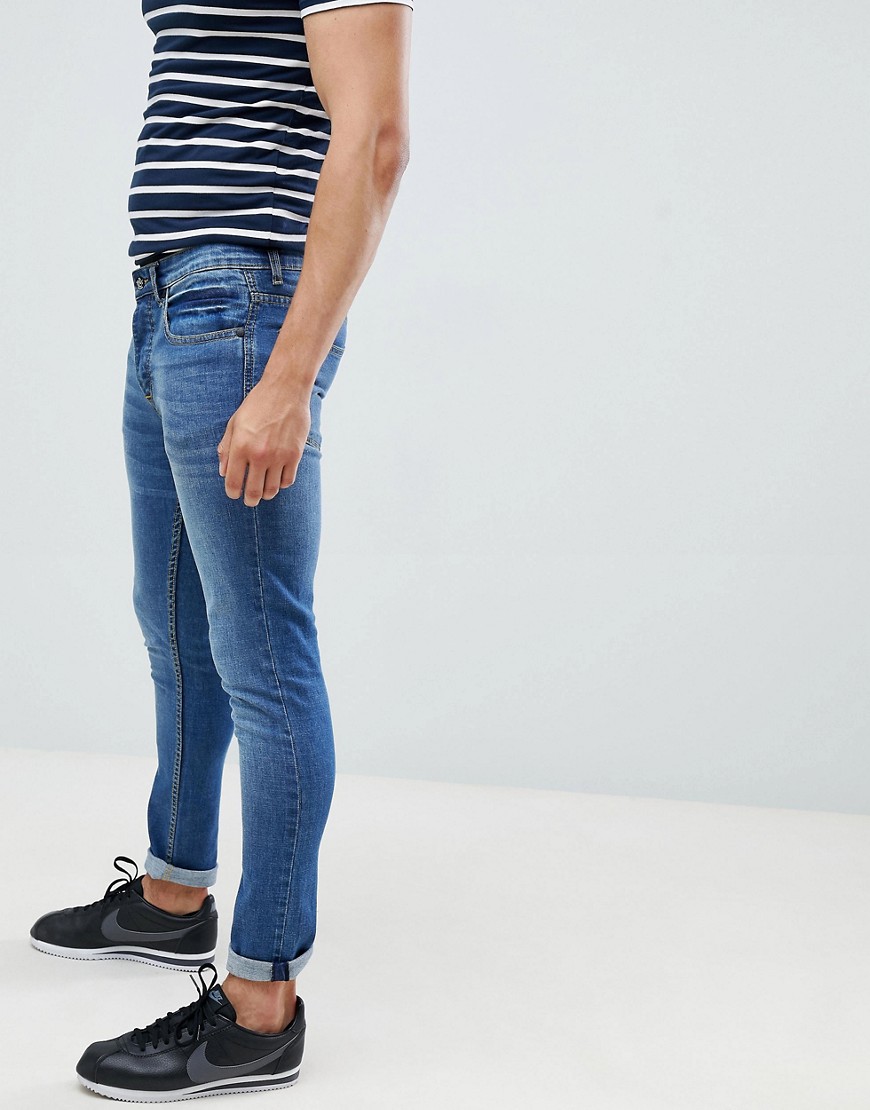 Mellemblå super-skinny jeans fra Saints Row