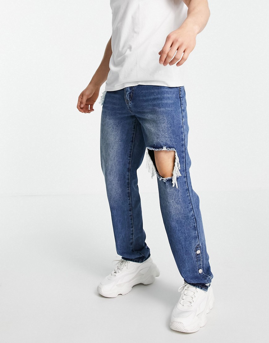 Mennace baggy jeans in vintage denim blue with rips and snap hems-Blues