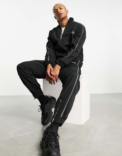 Mennace co-ord nylon joggers in black with reflective piping