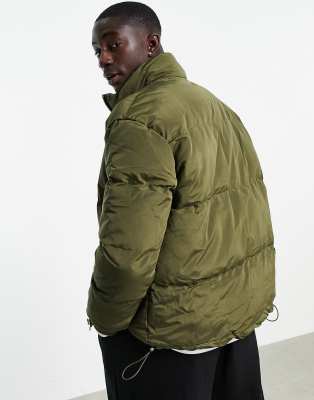 dark green puffer jacket