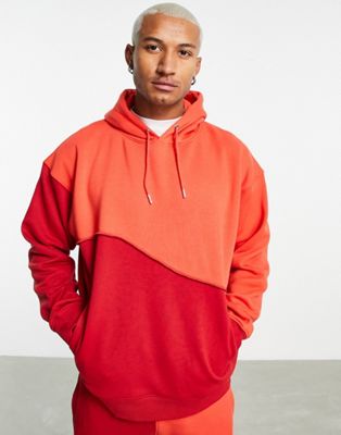 Mennace co-ord relaxed hoodie in two tone red with exposed seam detail