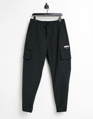 Mennace Mennace crinkle tech tracksuit cargo trousers in black