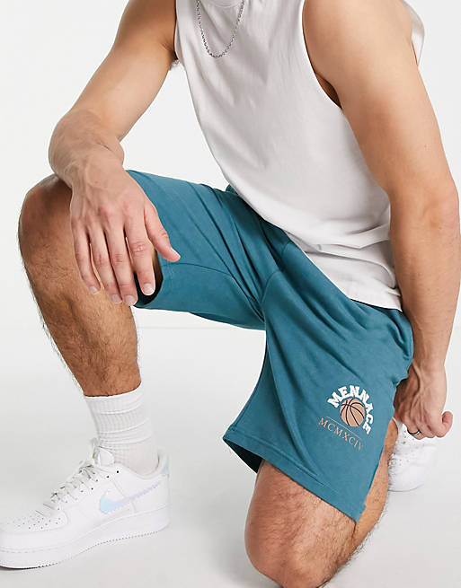Mennace jersey shorts in washed green with varsity print