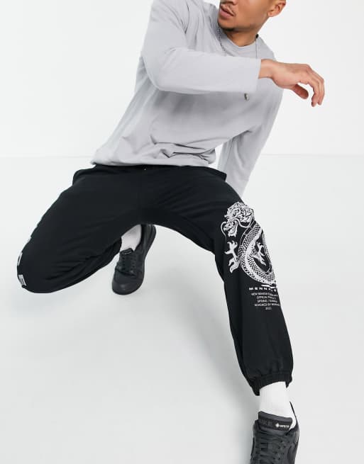 HUF dragon co-ord jersey joggers in black with placement prints