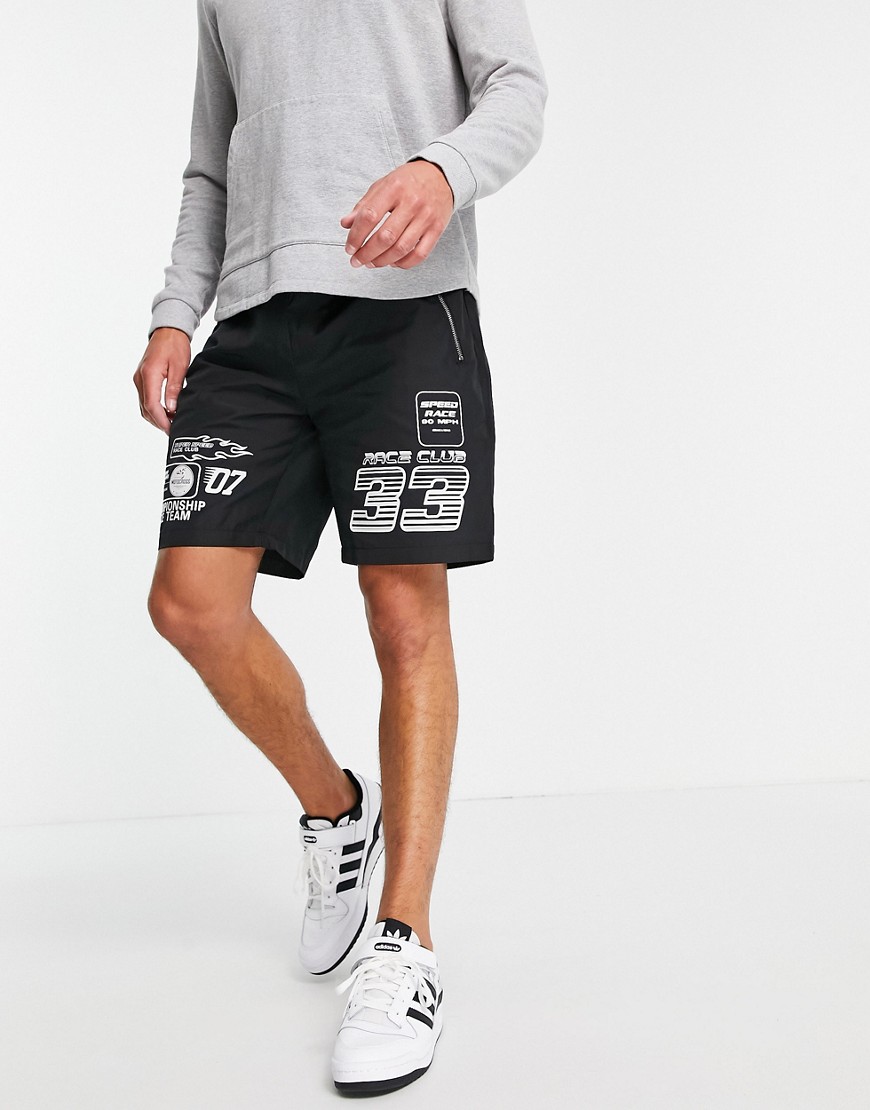 Mennace nylon shorts in black with motocross placement print