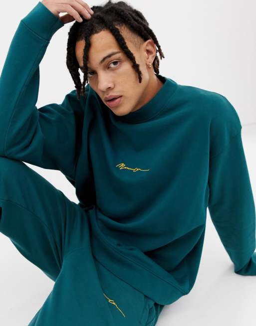 Mennace oversized sweatshirt in green with script logo