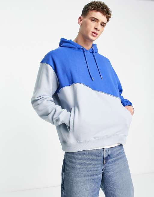 Mennace relaxed hoodie in two tone blue with exposed seam detail