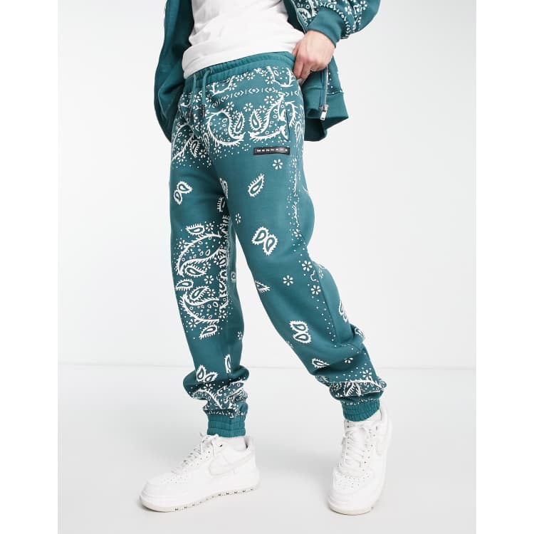 Mennace relaxed sweatpants in forest green paisley - part of a set