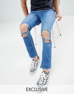 Mennace - Ruimvallende superskinny cropped jeans met scheuren en onafgewerkte in medium wassing-Blauw