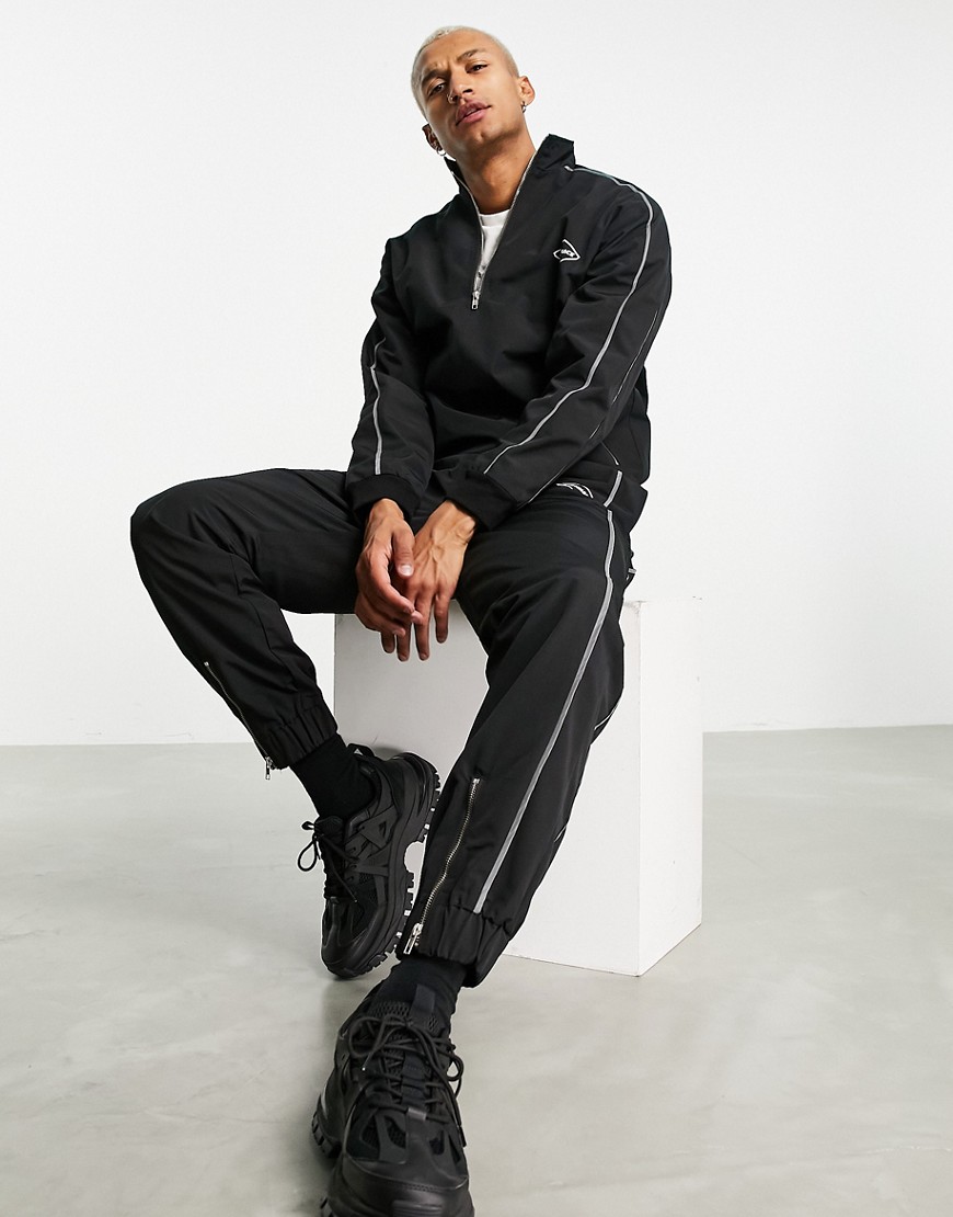 Mennace set nylon sweatpants in black with reflective piping