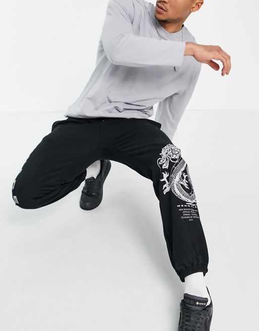 COLLUSION sweatpants with logo X dragon print in black - part of a set