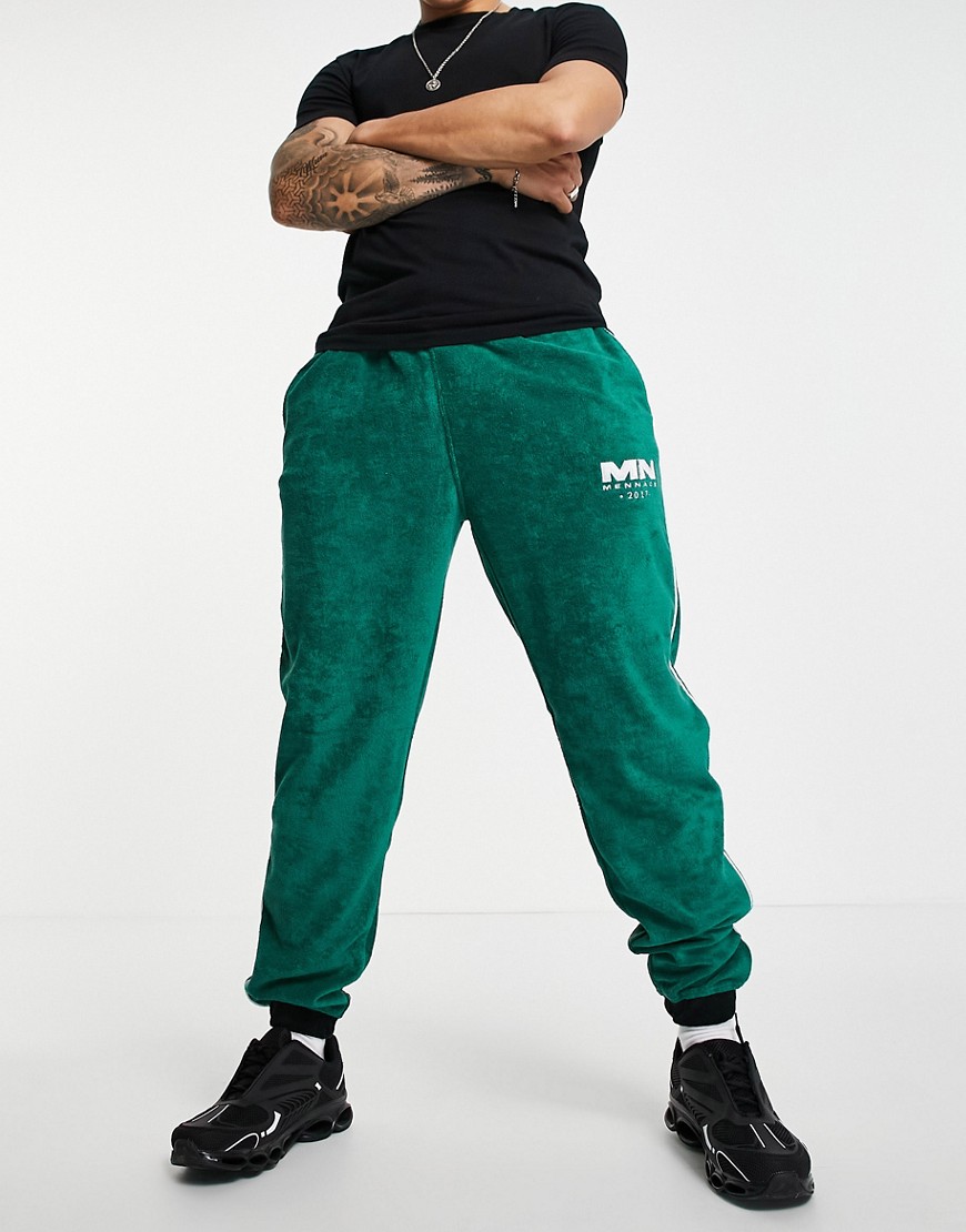 Mennace sweatpants in green terry with side stripe and zipped hem - part of a set