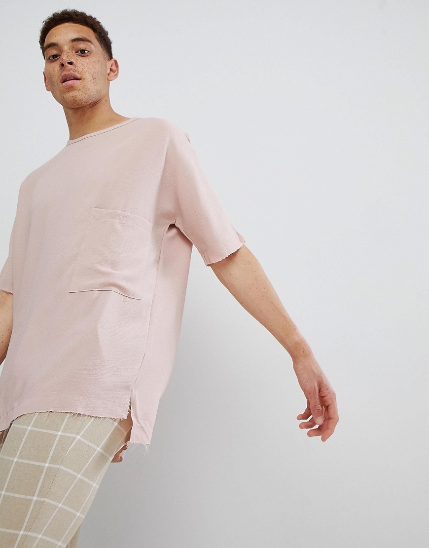 Mennace - T-shirt oversize rosa tinta unita con tasca