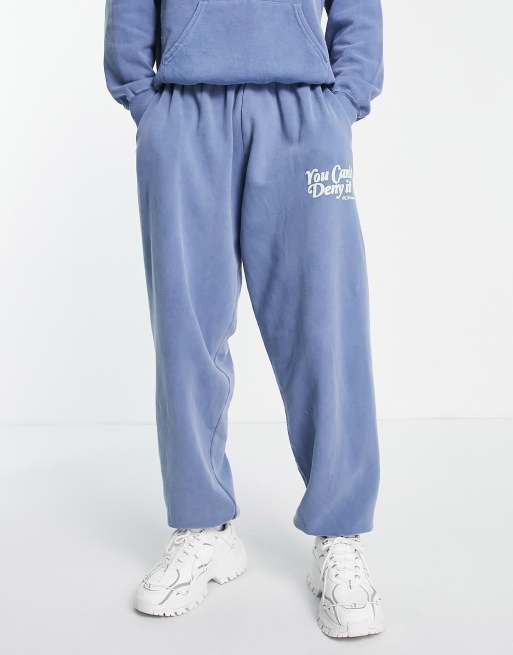 Mennace trackies in dusty blue with slogan print (part of a set)