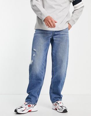 фото Мешковатые джинсы из смесового органического хлопка выбеленного оттенка с потертостями asos design-голубой