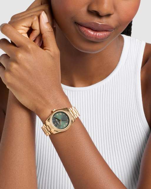 Michael Kors Lexington three-hand gold-tone stainless steel watch in gold, 2 of 4