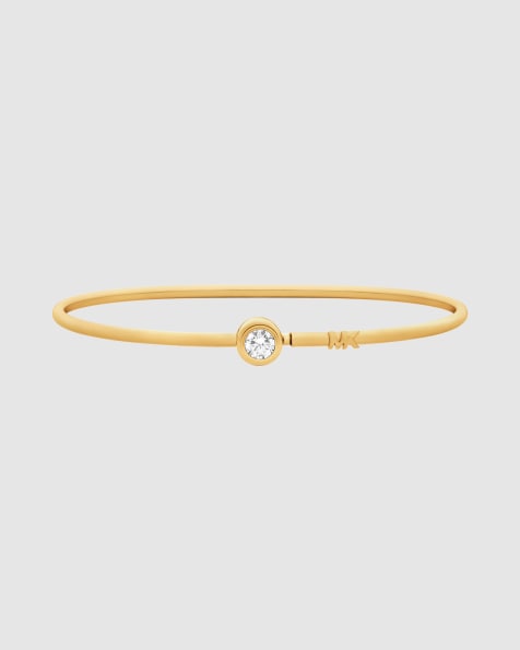 Michael Kors Solitaire wire bangle bracelet in gold - view 1