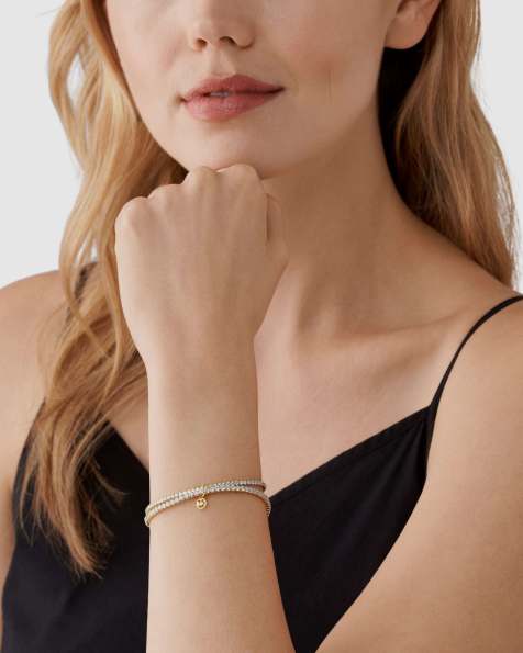 Michael Kors Women's premium kors brilliance gold-tone brass double bracelet, mkj8359cz710 in gold - view 1