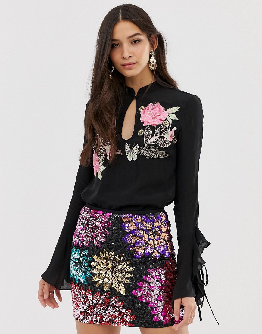 Millie Mackintosh rose embroidered ruffle sleeve top-Black