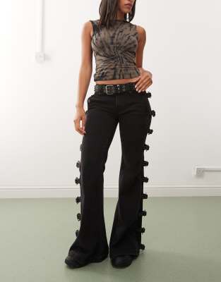 Minga London Buckle Up Strap Flared Jeans In Black