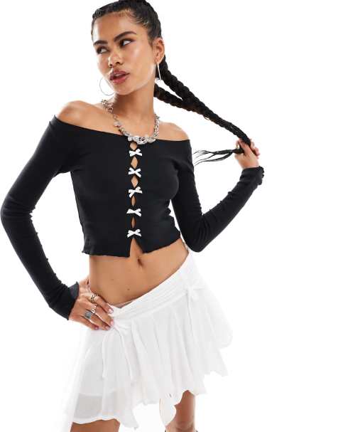 Minga London cutout long sleeve top with bows in black - view 1