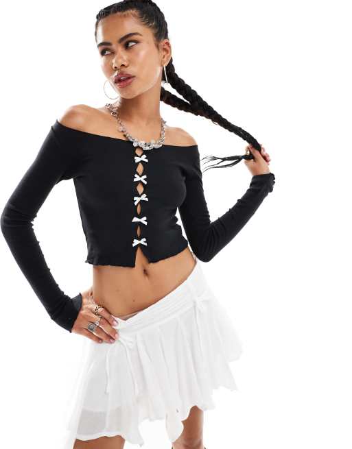 Minga London cutout long sleeve top with bows in black