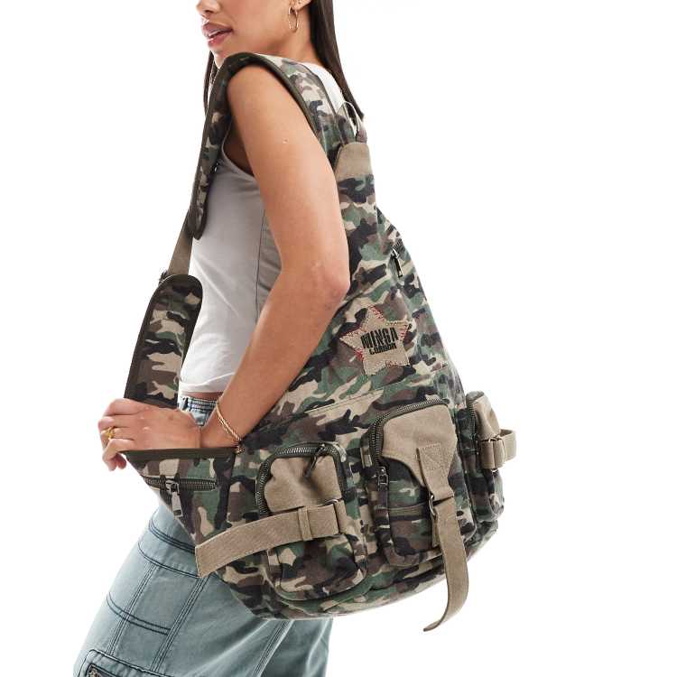 Minga London denim sling cross body bag in camo | ASOS