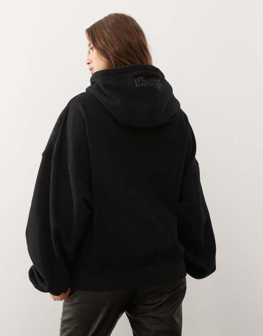 Minga London skull studded graphic zip up hoodie in black | ASOS