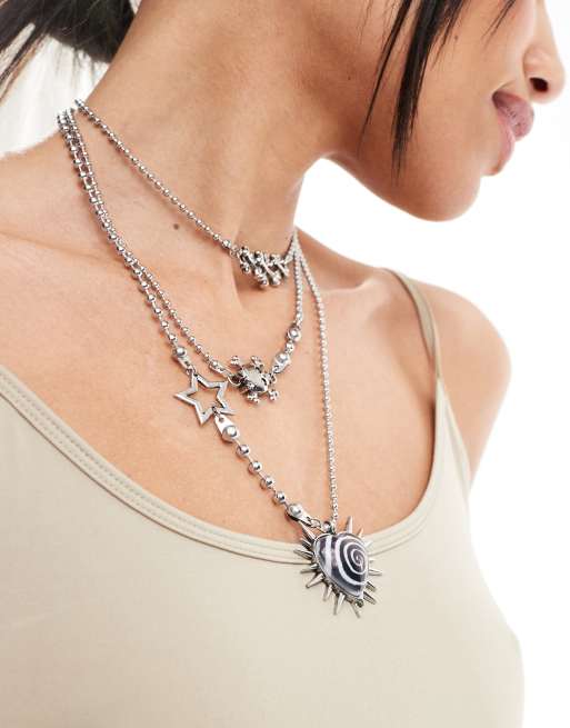 Minga London spike swirl heart layered necklace in silver | ASOS