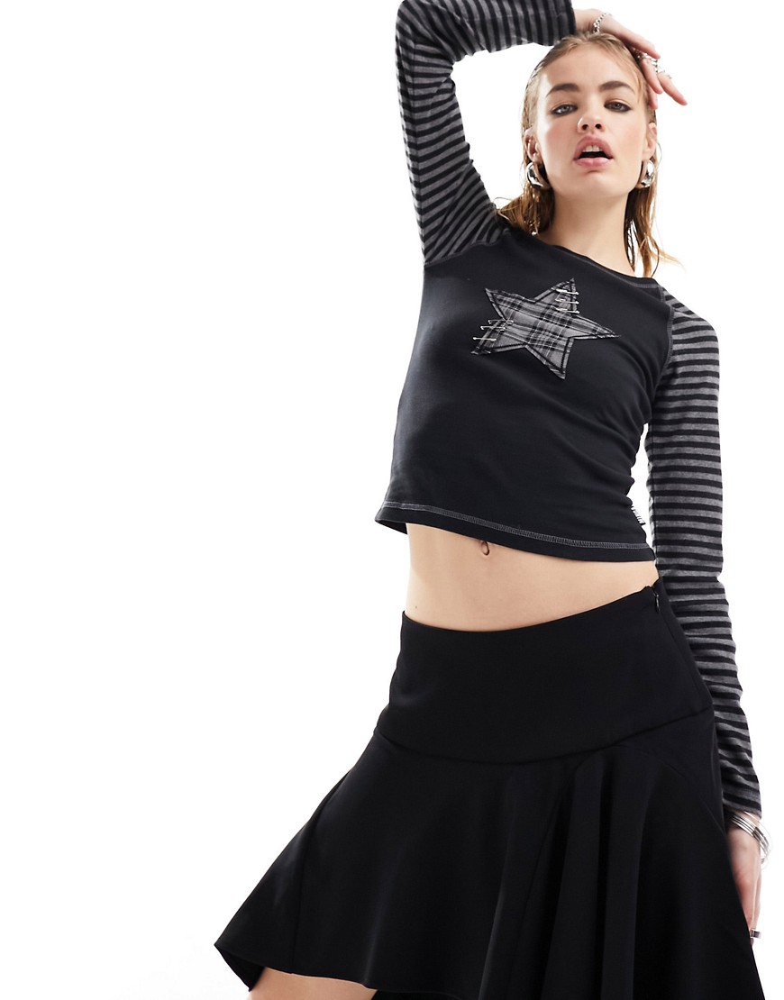 Minga London stripe sleeve fitted long sleeve top with star patch in black and grey