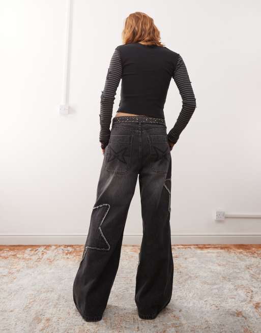 Minga London washed distressed baggy jeans with star graphic in