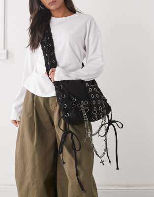 Minga London washed twill eyelet cross body bag in black | ASOS