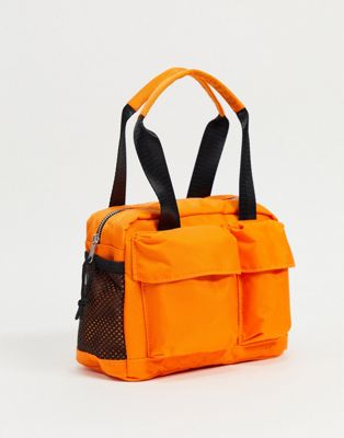 фото Миниатюрная сумка-тоут из оранжевого нейлона с несколькими отделениями и деталями из сетки asos design-оранжевый