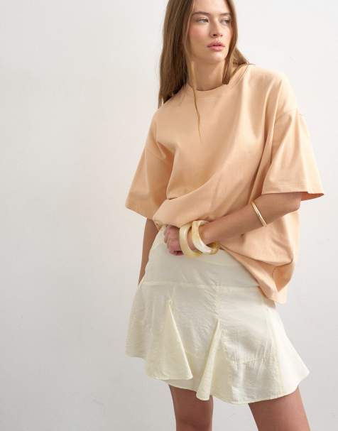 Minifalda color crema con bajo de godets de Topshop - view 1