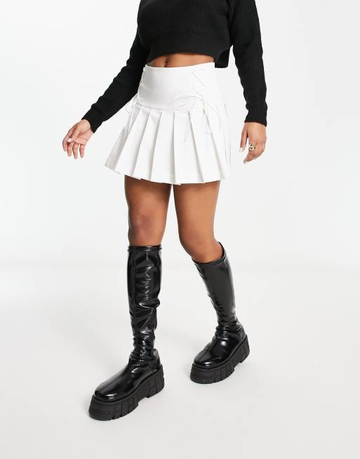Minifalda escocesa color marfil plisada con detalle de cordones de Miss Selfridge